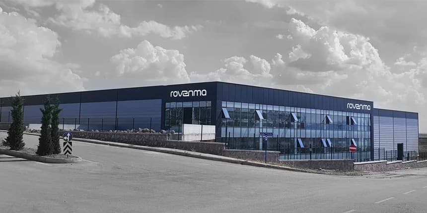 Rovenma’s factory: a long dark-blue building with the Rovenma name on its facade